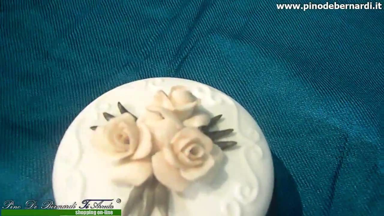 Oggettistica in ceramica.porcellana - scatolina con basamento in legno - Prodotto venduto