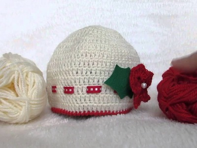 Cappello Natale bimbi, bianco e rosso, lavorato a uncinetto e realizzato a mano con applicazioni.