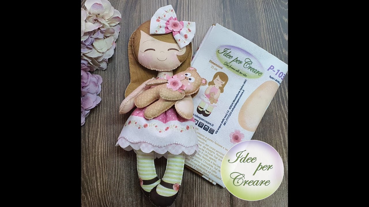 P 103 Bambola con orsetto