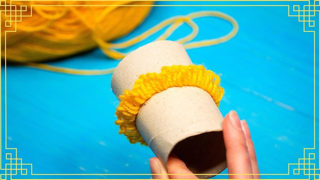 Facile trucco per realizzare fiori di lana grazie a un tubetto di carta igienica!