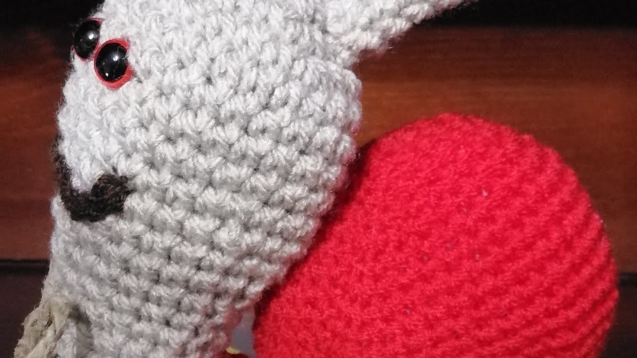 Lumaca amigurumi con cuore ad uncinetto