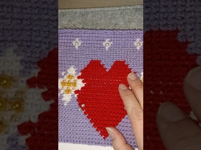 Pochette cuore fiorito con perle