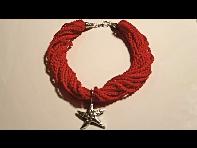Collana realizzata all'uncinetto in cordino swan rosso con stella marina